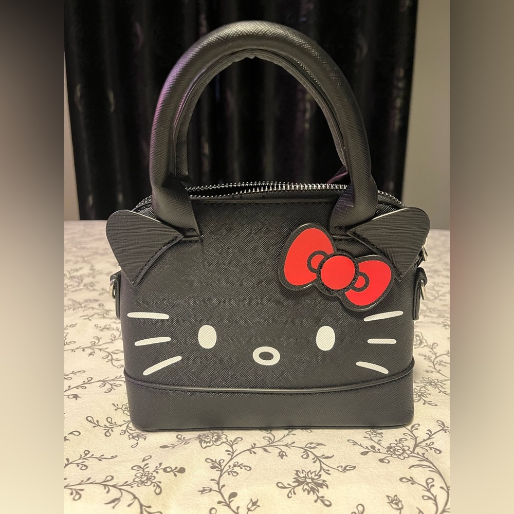 Brand new without tags Hello Kitty Black and Red Handbag w/strap
